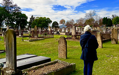 Woman overlooking Richmond Anglican Cemetery