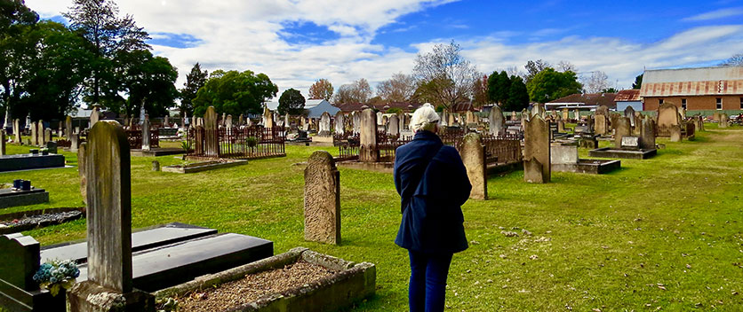 Woman overlooking Richmond Anglican Cemetery