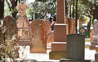 Headstones in graveyard