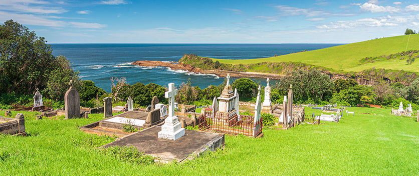 View of graveyard on hill