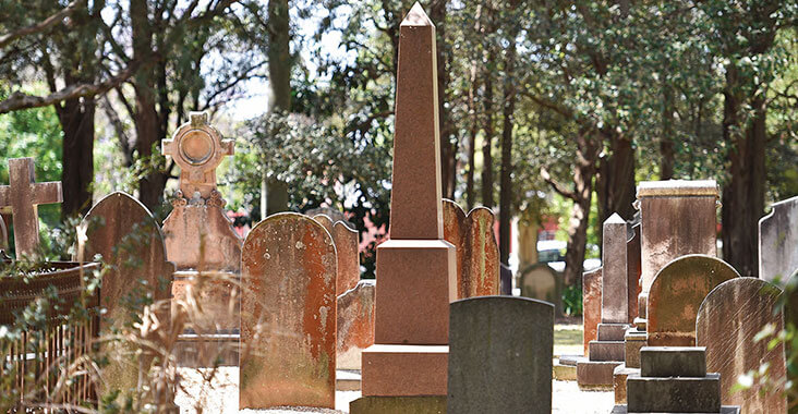 Headstones in graveyard